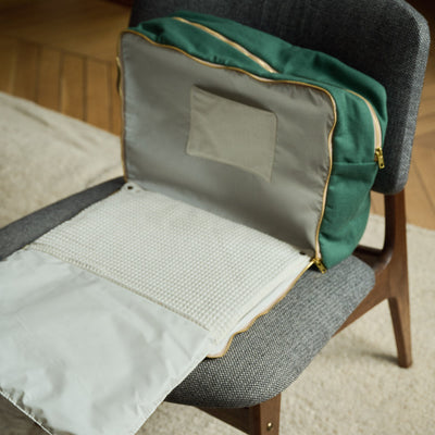 sac à langer ouvert avec matelas intégré couleur verte